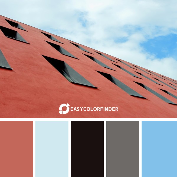 A pleasing contrast between the rwall of a building and a bright sky.