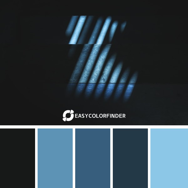 In the stairwell of my library the afternoon light fell through the metal railing thereby casting a unique shimmering ligh...