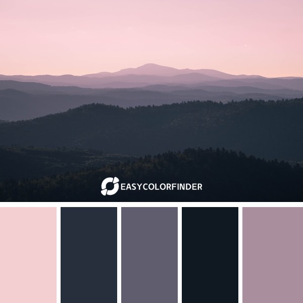 Lost in the beauty of natures canvas where the mountains meet the pink hues of a breathtaking sunset.