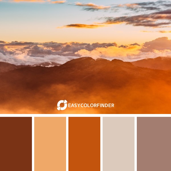 Orange clouds over mountains