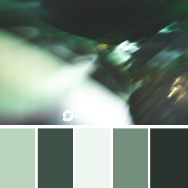 a blurry photo of a green and blue background