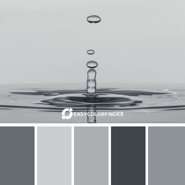 a drop of water falling into a body of water