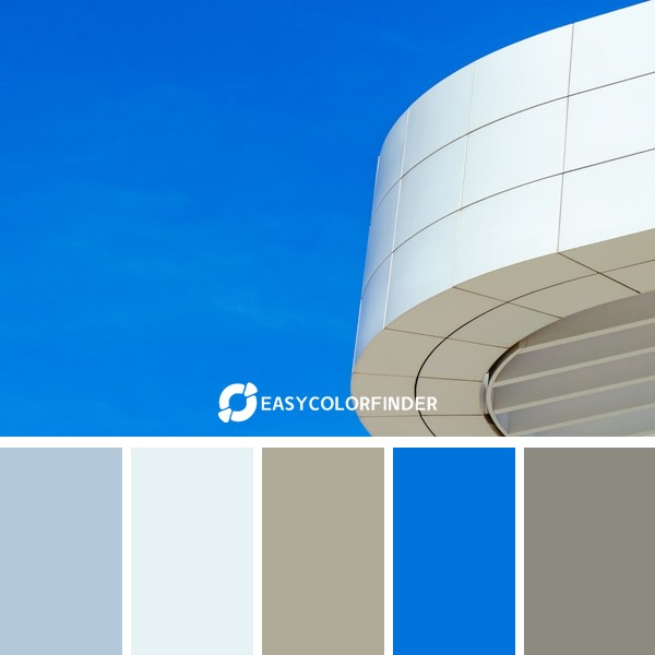 a white building with a blue sky in the background