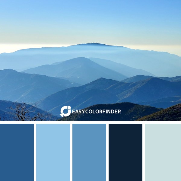black and white mountains under blue sky during daytime