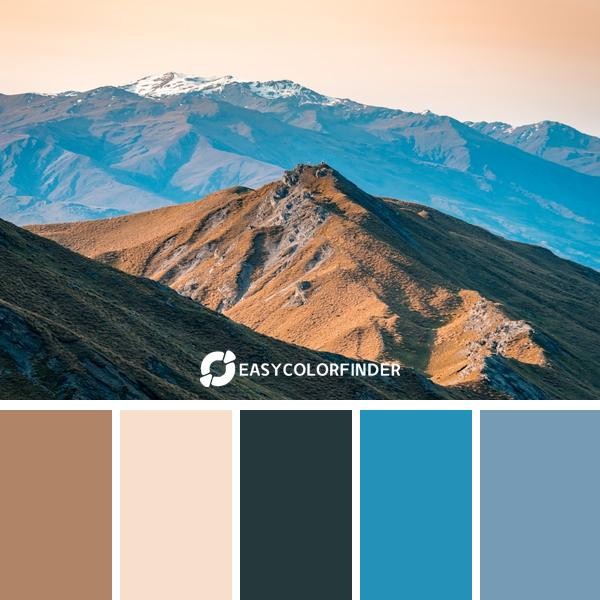 brown and gray mountains under blue sky during daytime