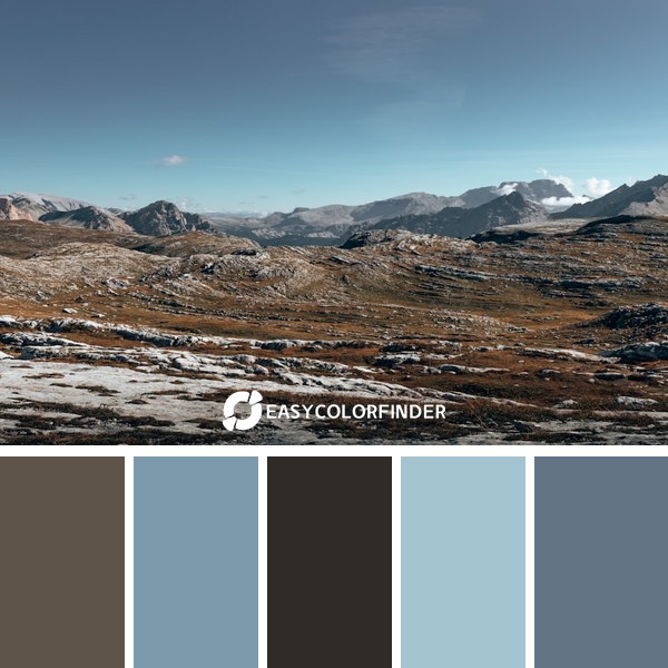 brown and white mountains under blue sky during daytime