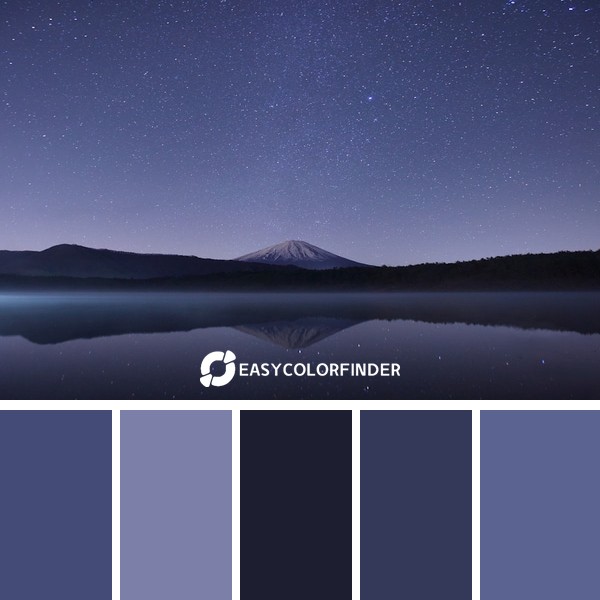 calm body of water near alp mountains during nighttime