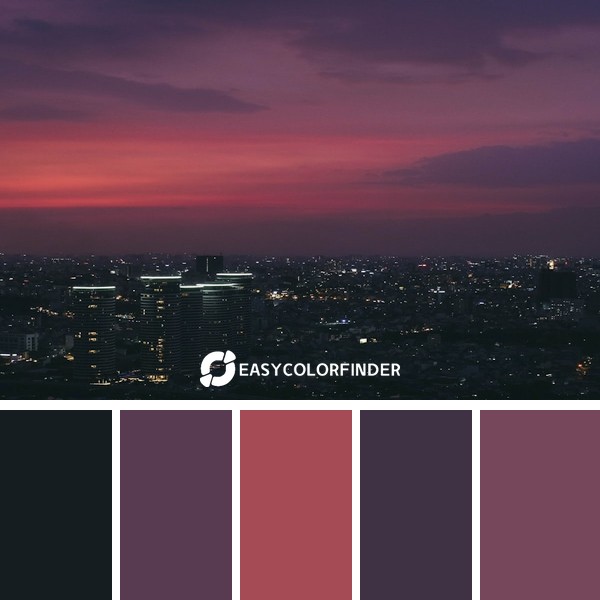 cityscape under purple sky