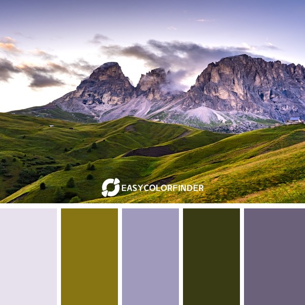 green and gray mountains under white clouds during daytime