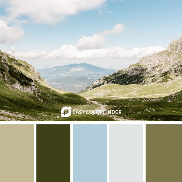 green mountains under cloudy sky