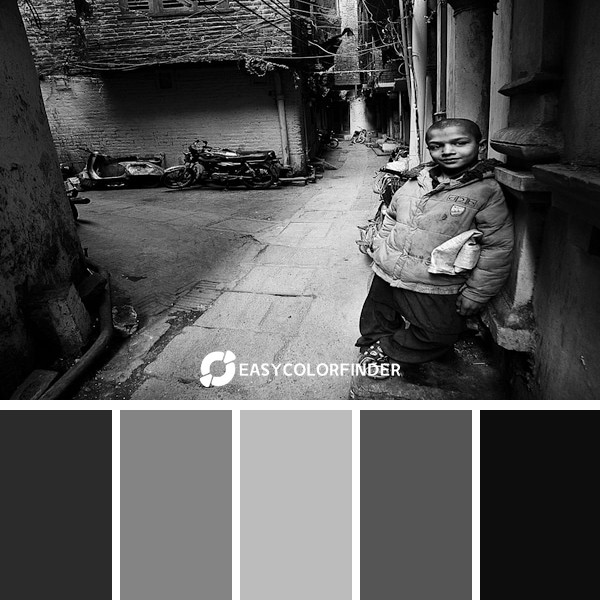 greyscale photo of boy