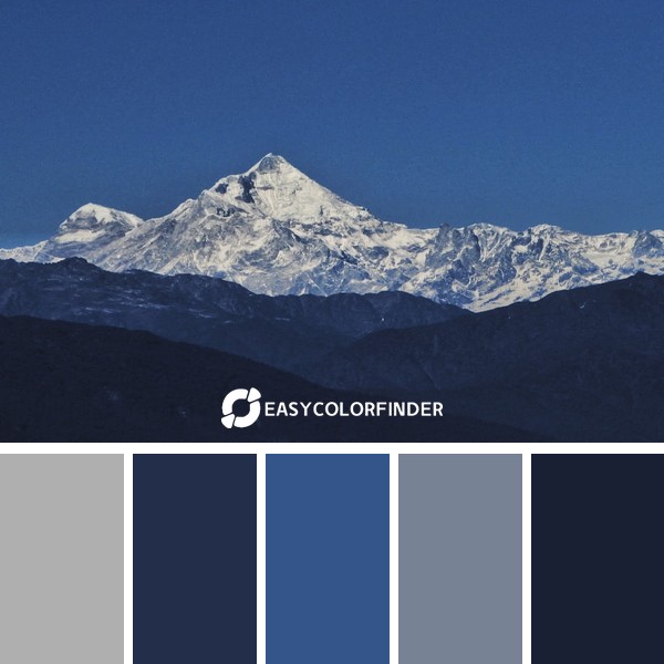 mountain range coverwith snow