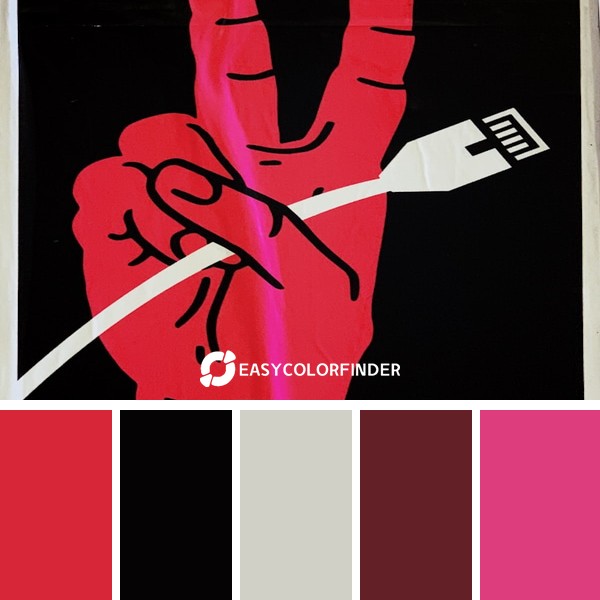 peace sign while holding white cable