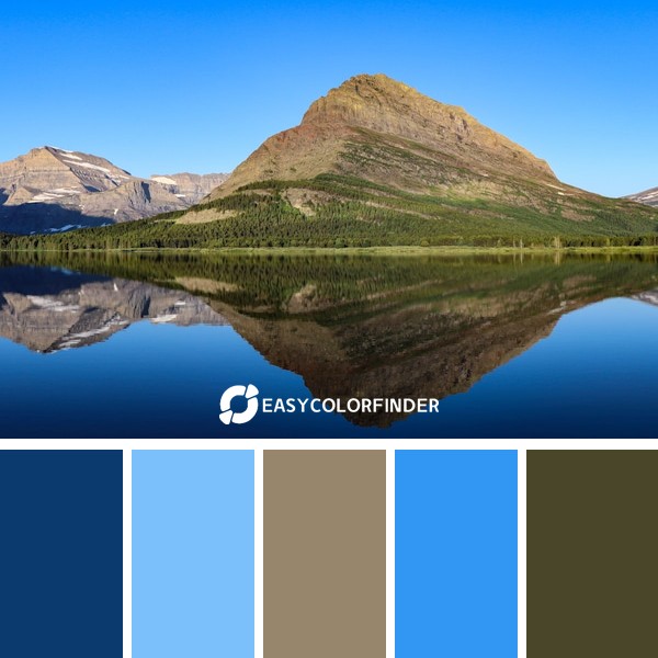 reflections of mountain on water