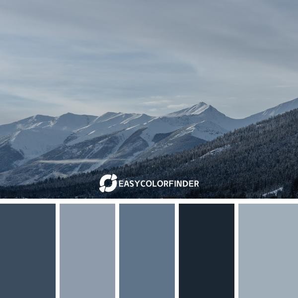 snow covermountains under cloudy sky during daytime