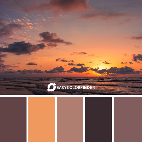 the sun is setting over the ocean on the beach